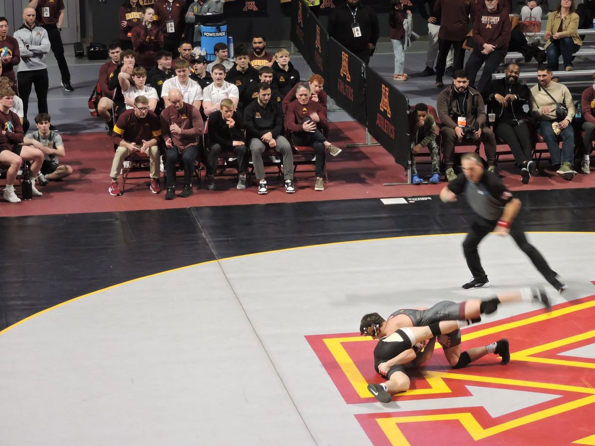 UFC Heavyweight Champion Jon "Bones" Jones and UM Heavyweight Wrestler Gable Steveson Enjoy Gophers Wrestling
