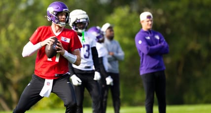 Minnesota Vikings practice - Carson Wentz with JJ McCarthy in the background