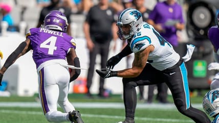 Giovanni Ricci trying to tackle Brandon Powell - Minnesota Vikings at Carolina Panthers