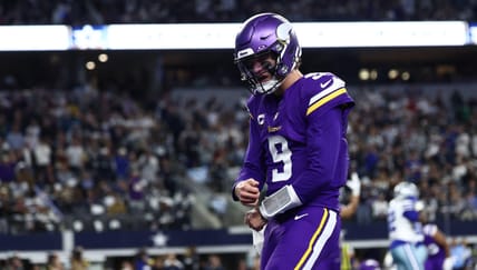 JJ McCarthy celebrates after scoring a touchdown : Minnesota Vikings at Dallas Cowboys