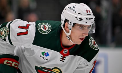 Sep 23, 2025; Dallas, Texas, USA; Minnesota Wild defenseman Carson Lambos (71) looks on during the game between the Dallas Stars and the Minnesota Wild at American Airlines Center. Mandatory Credit: Jerome Miron-Imagn Images