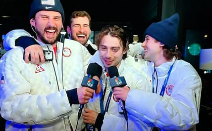 Minnesota Wild defenseman Quinn Hughes celebrating Team USA Gold Medal
