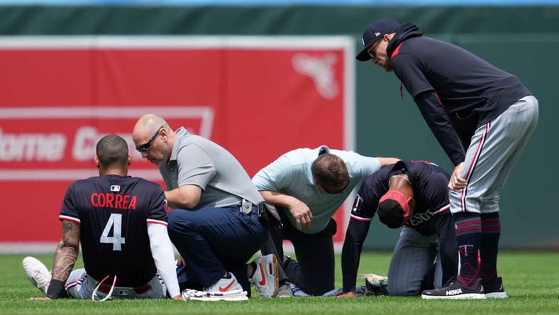 Byron Buxton, Carlos Correa after colliding in center field - Minnesota Twins at Baltimore Orioles