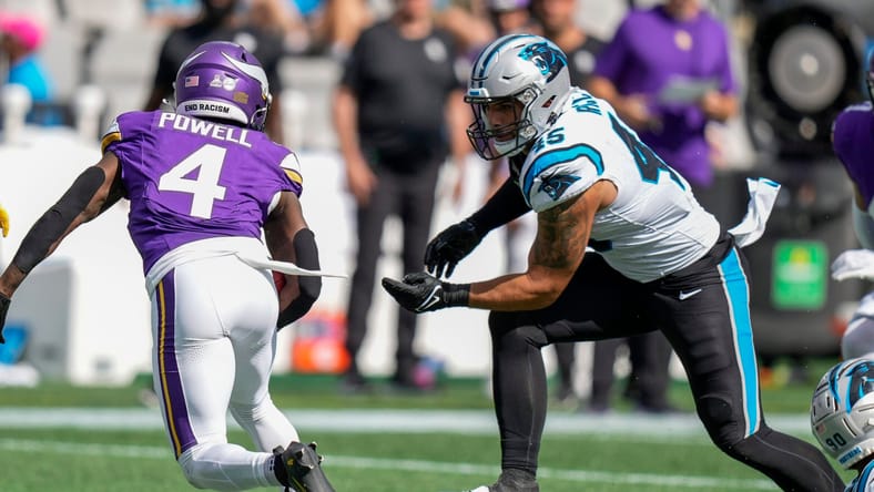 Giovanni Ricci trying to tackle Brandon Powell - Minnesota Vikings at Carolina Panthers