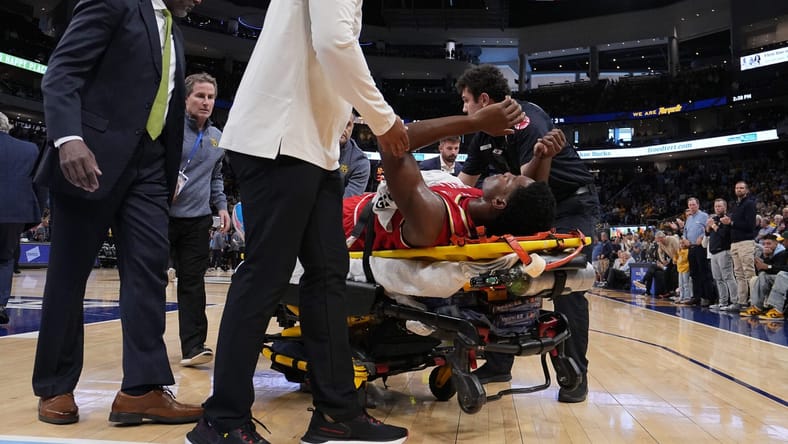 Pharrel Payne (Cottage Grove, MN) stretchered off court - Maryland vs Marquette