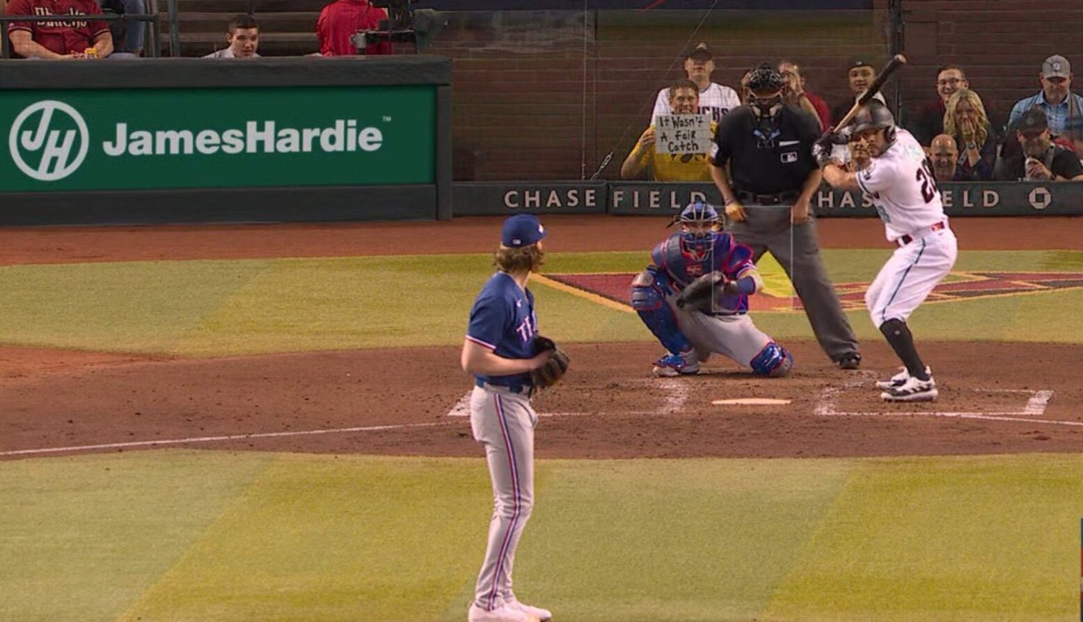 Iowa Fan Holds Sign at World Series Reading "It Wasn't a Fair Catch"